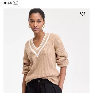 Elegant Tan V-Neck Sweater with White Trim